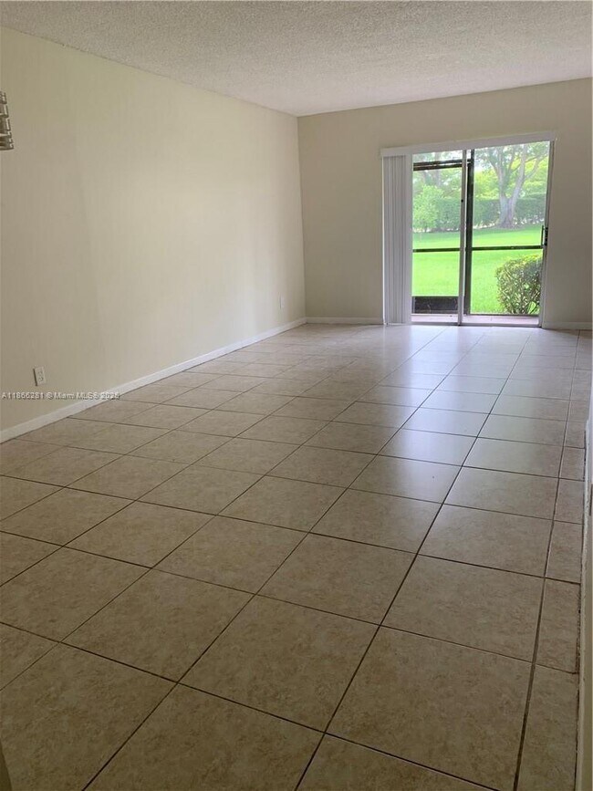 property at 10330 NW 8th St