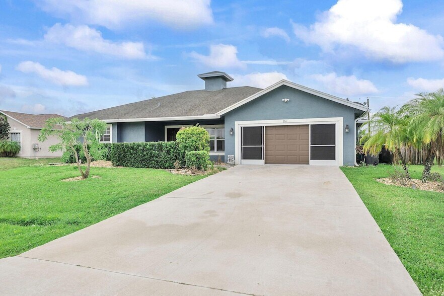 114 SW Grimaldo Terrace in Port St. Lucie, FL - Building Photo