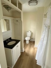 122 Sibben St, Unit Apartment A in Manistee, MI - Building Photo - Building Photo