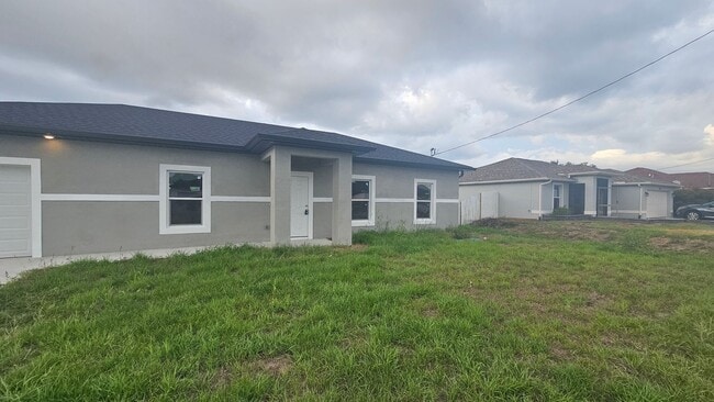 3812 25th St SW in Lehigh Acres, FL - Building Photo - Building Photo