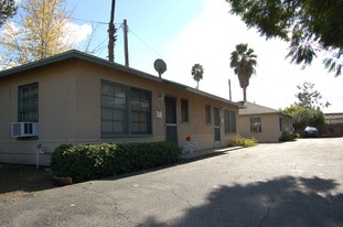 Quadruplex + 1 Home Apartments