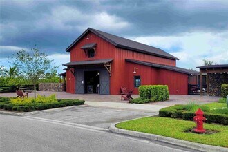 1200 Sterling Pine Pl in Loxahatchee, FL - Building Photo - Building Photo