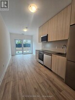 7437 Kingston Rd in Toronto, ON - Building Photo