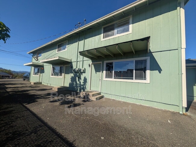 property at 84 SE Grape Ave