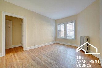 1333 W Touhy Ave, Unit 1E in Chicago, IL - Building Photo - Building Photo