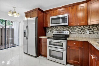 3037 NW 48th Ave in Coconut Creek, FL - Building Photo - Building Photo