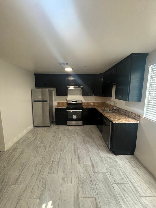 1229 W Gage Ave in Los Angeles, CA - Building Photo