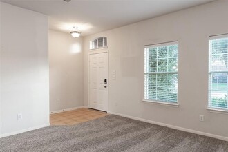 21430 Roaring Hill Ct, Unit 104 in Katy, TX - Foto de edificio - Building Photo