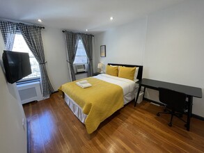 115 E 37th St in New York, NY - Building Photo - Building Photo