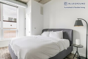 61 W Erie St, Unit SI FL3-ID1402 in Chicago, IL - Building Photo