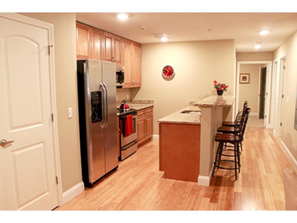 67 Provencal Rd-Unit -412 in Laconia, NH - Building Photo