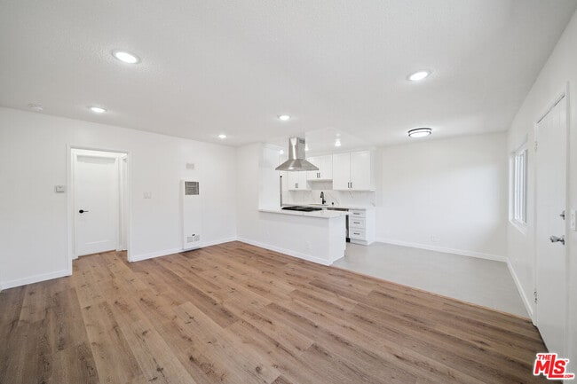 property at 7209 Willoughby Ave
