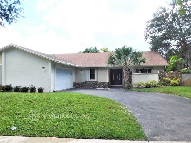 property at 9080 NW 13th St