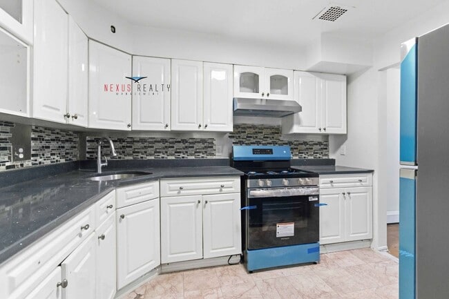 property at 40-83-83 Denman St