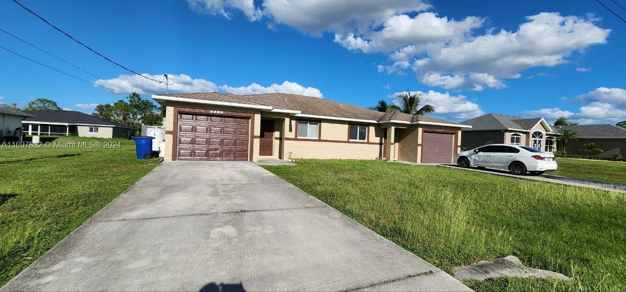 5112 27th St SW-Unit -1 in Lehigh Acres, FL - Building Photo