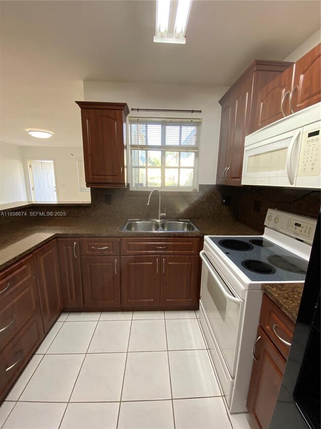 property at 6763 NW 182nd St