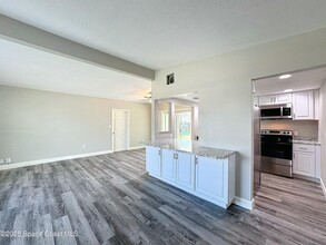 1035 Butia St in Merritt Island, FL - Building Photo - Building Photo