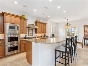 16653 Toscana Cir-Unit -702 in Naples, FL - Building Photo - Building Photo
