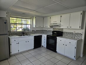 12407 Spanish Moss Dr in Hudson, FL - Foto de edificio - Building Photo