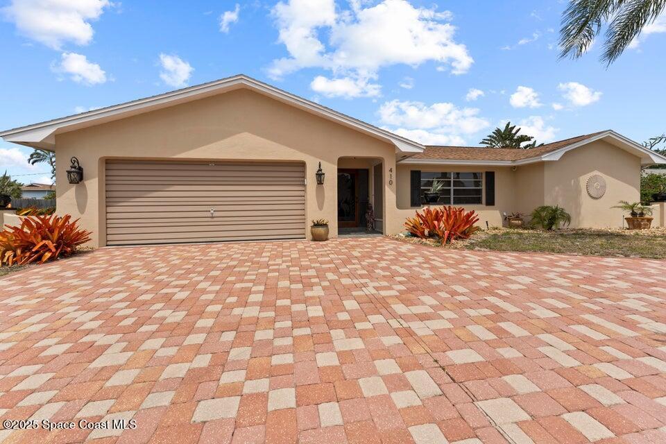 410 Surf Rd in Melbourne Beach, FL - Foto de edificio