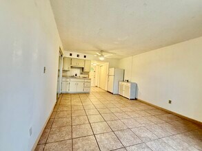 306 Golf Villas Ct NW, Unit 306 in Lake Placid, FL - Foto de edificio - Building Photo