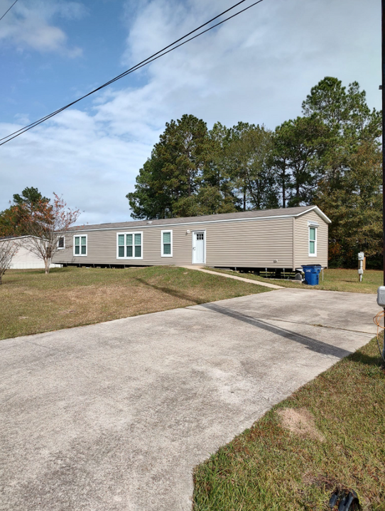 6565 Poppy Dr in Lumberton, TX - Building Photo