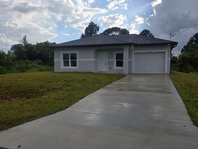 1608 Irene Ave S in Lehigh Acres, FL - Building Photo - Building Photo