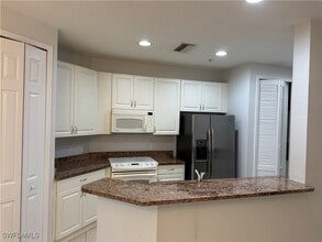 1380 Sweetwater Cove in Naples, FL - Building Photo - Building Photo