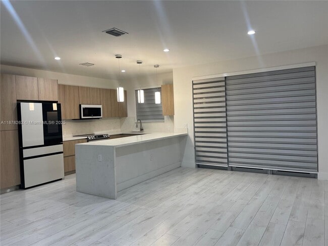 property at 3155 NW 103rd St