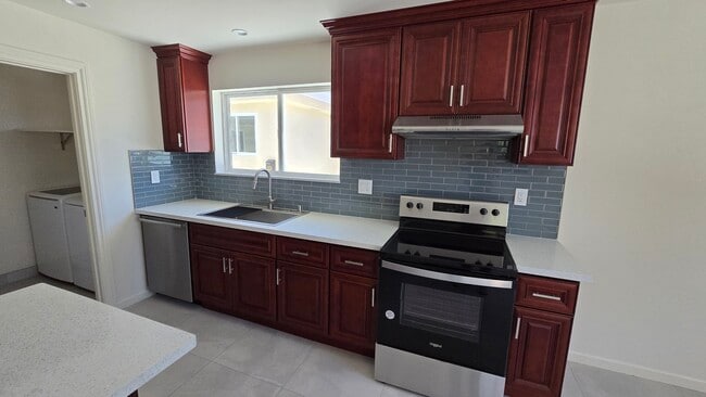 property at 10931 Hayvenhurst Ave