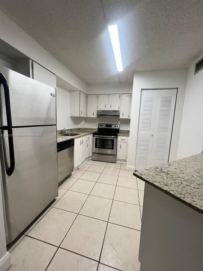 property at 6195 NW 186th St