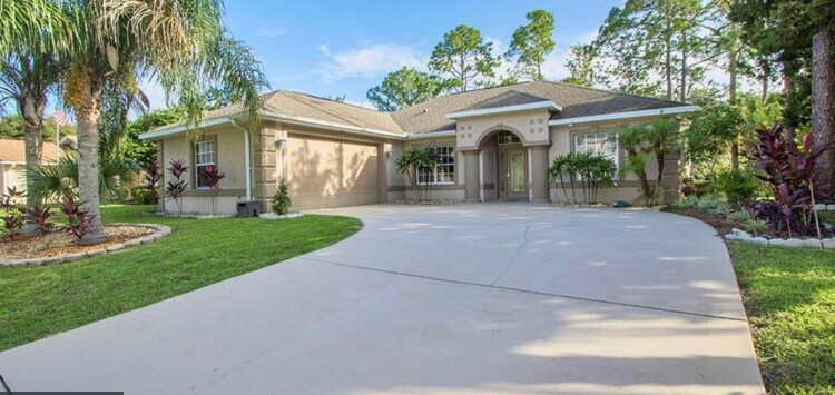 92 Belleaire Dr in Palm Coast, FL - Building Photo