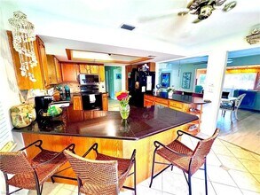 1912 Sheffield Ave in Marco Island, FL - Foto de edificio - Building Photo