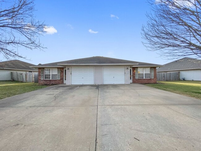 property at 409 NW Woodbury Dr