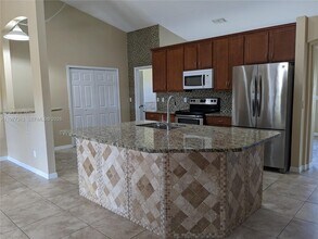 4438 SW Athena Dr in Port St. Lucie, FL - Building Photo - Building Photo