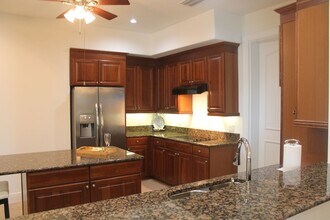 1446 Borghese Ln in Naples, FL - Building Photo - Building Photo