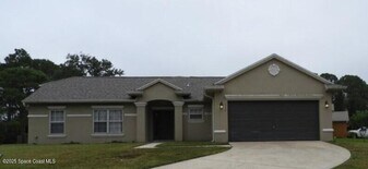 394 Mott St SW in Palm Bay, FL - Building Photo