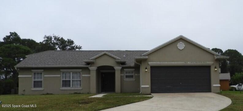 394 Mott St SW in Palm Bay, FL - Building Photo