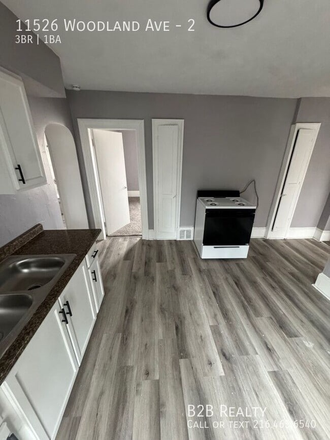 property at 11526 Woodland Ave