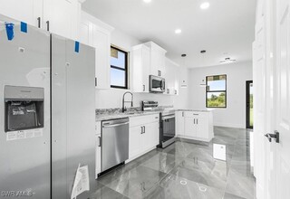 128 Nave Ave S in Lehigh Acres, FL - Building Photo - Building Photo