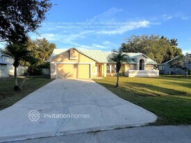 1649 SE Lorraine St in Port St. Lucie, FL - Building Photo