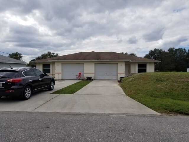 1116-1118 Ichabod Ave in Lehigh Acres, FL - Building Photo