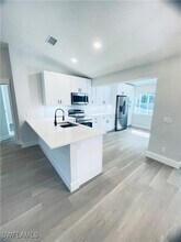 390 20th Ave NW in Naples, FL - Building Photo - Building Photo