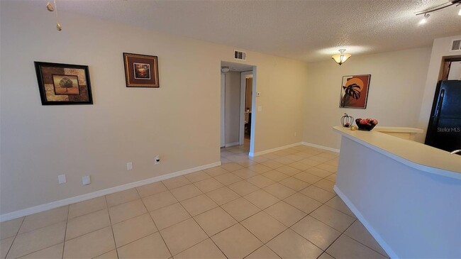 5785 Gatlin Ave, Unit 714 in Orlando, FL - Building Photo - Building Photo
