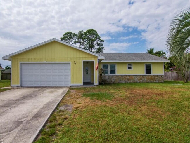 property at 134 SE Whitmore Dr