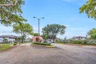 20840 San Simeon Way, Unit 409 in Miami, FL - Building Photo - Building Photo
