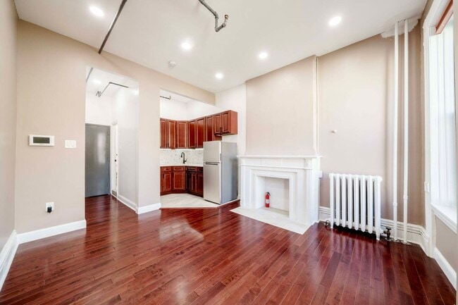 property at 211 W 122nd St