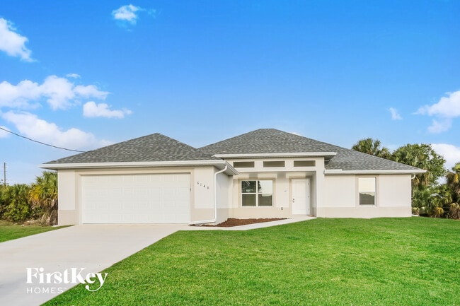 6148 Hellman Ave in Ft. Myers, FL - Foto de edificio - Building Photo