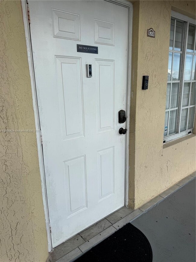 6940 NW 179th St, Unit 405-7 in Hialeah, FL - Building Photo - Building Photo