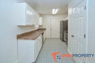 7708 N Wyatt Earp Ave in Eagle Mountain, UT - Building Photo - Building Photo